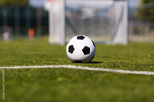 Green pitch with soccer ball © Mikkel Bigandt