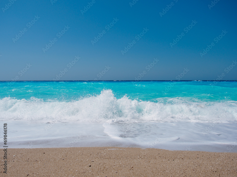 wild beach with rocks in water. Island Lefkada, Greece wild beach with rocks in water. Island Lefkada, Greece