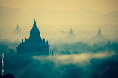Sunrise over temples of Bagan in Myanmar with cross-processed co © SANCHAI