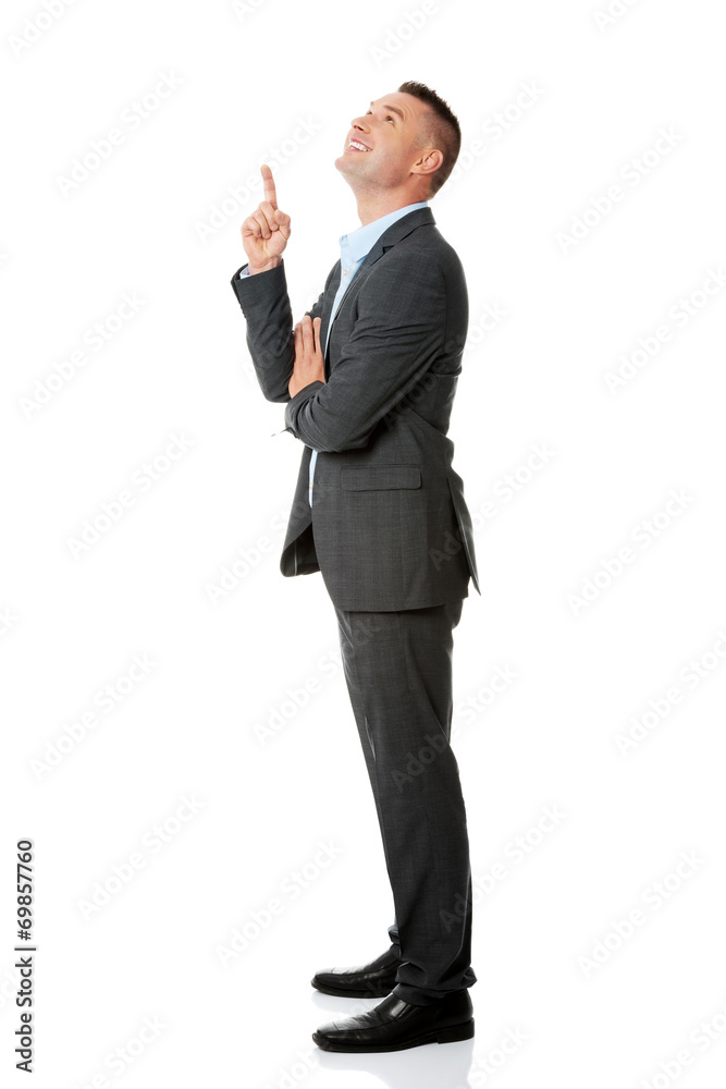 Businessmanshowing copy space Businessmanshowing copy space