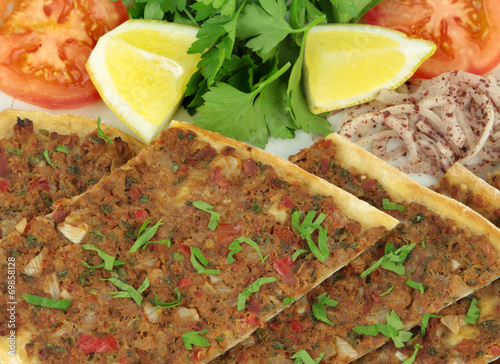 Delicious Turkish Pizza. ( Lahmacun or Etli ekmek ) Close-up