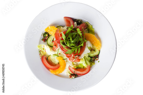 salad with red fish, tomatoes, cucumbers and oranges