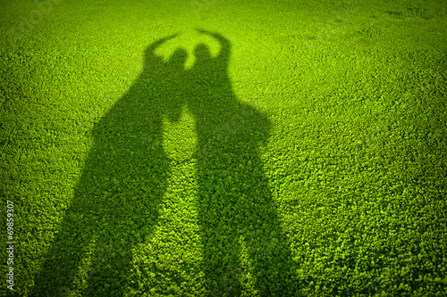 Silhouettes on the grass