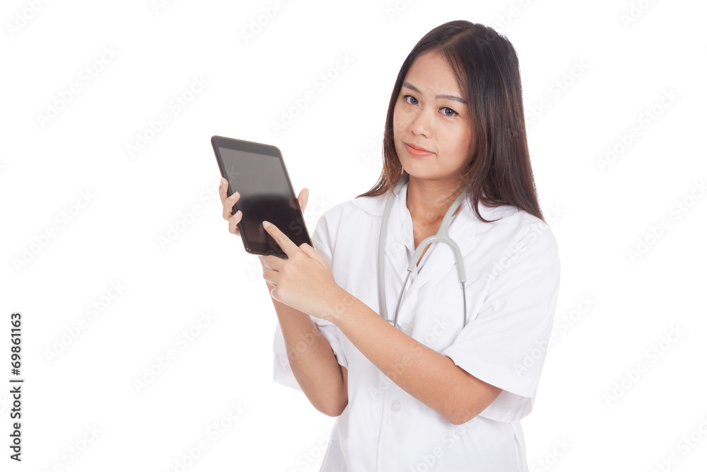 Asian young female doctor touch screen on tablet pc Asian young female doctor touch screen on tablet pc