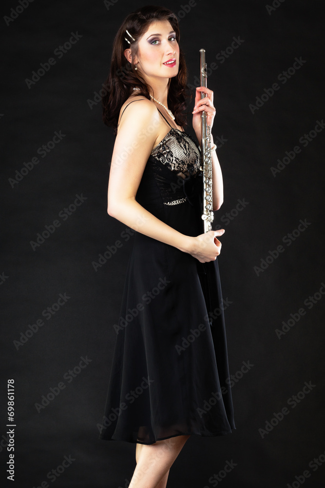 Art. Woman flutist flautist with flute. Music. Art. Woman flutist flautist with flute. Music.