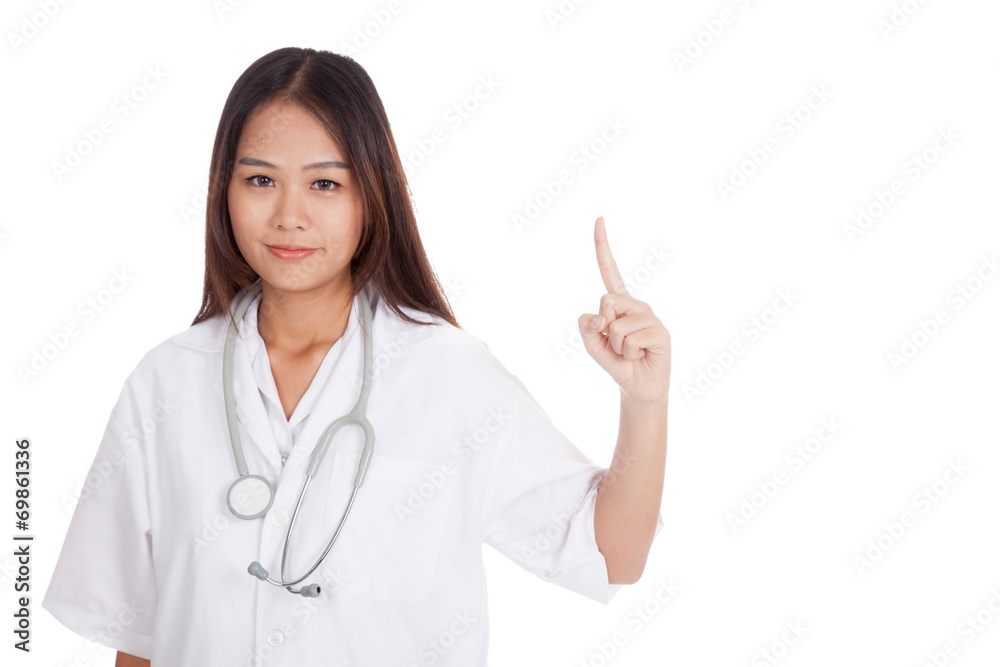 Asian young female doctor point up