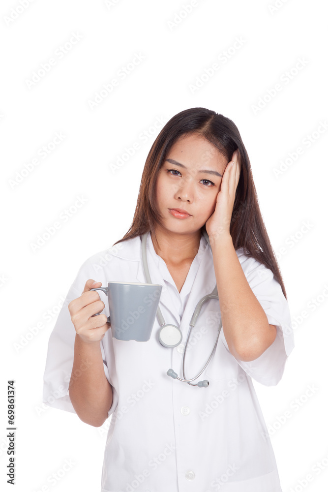 Portrait of Asian young female doctor got headache Portrait of Asian young female doctor got headache