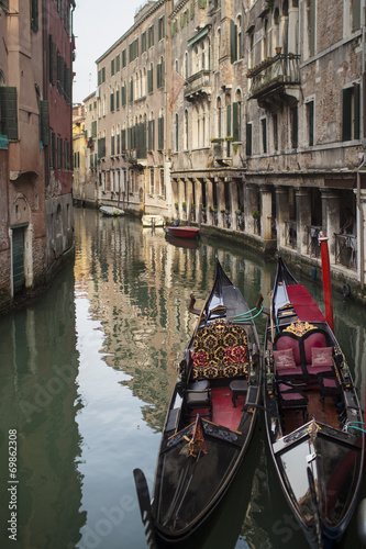 Venetian gondolas at canal, Venice, Italy © Volodymyr
