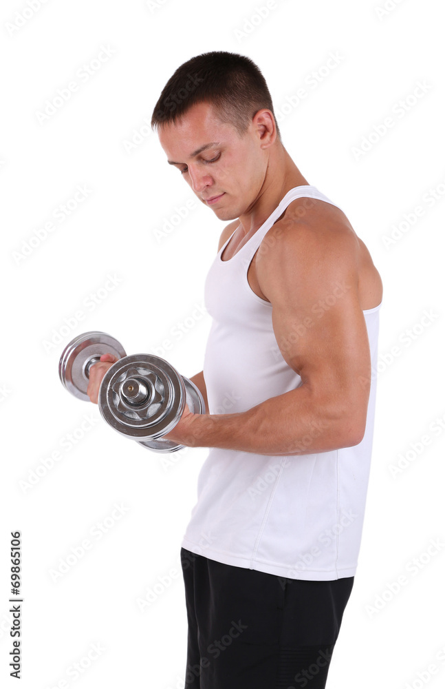 Young muscular sportsman execute exercise with dumbbells Young muscular sportsman execute exercise with dumbbells