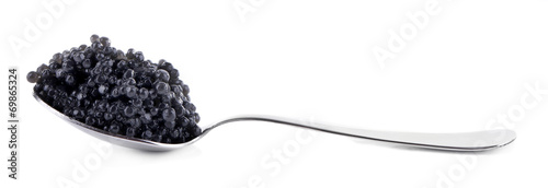 Black caviar in spoon isolated on white