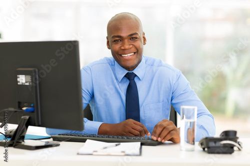 african american office worker looking at the camera
