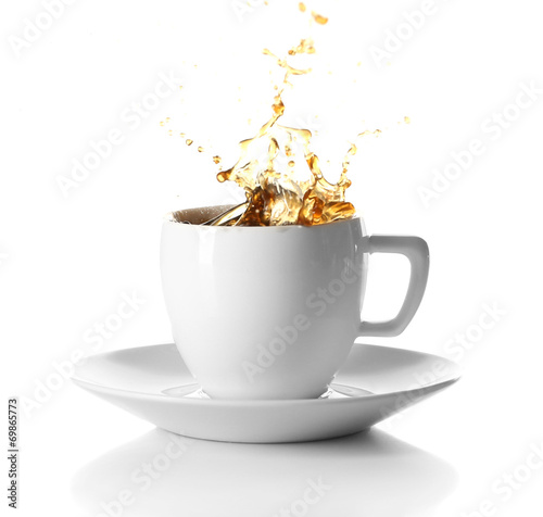 Cup of coffee with splashes, isolated on white