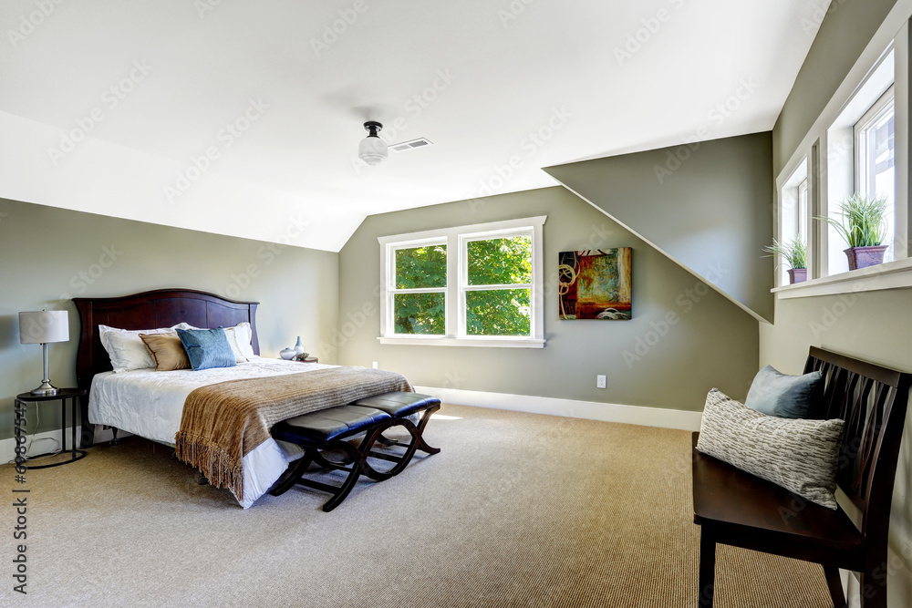 Bedroom with green walls and vaulted ceiling Stock Photo | Adobe Stock
