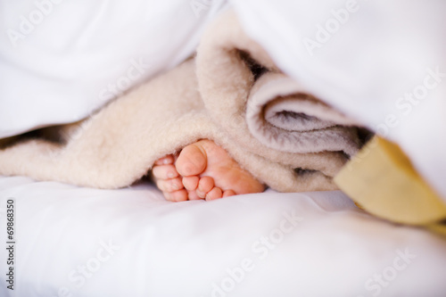 Feet of little sleeping child © Irina Schmidt