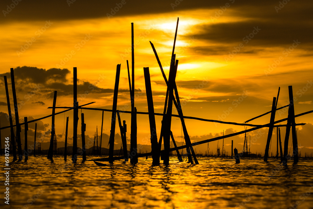 Silhouette of fish cage on sunset in Songkhla province, Thailand