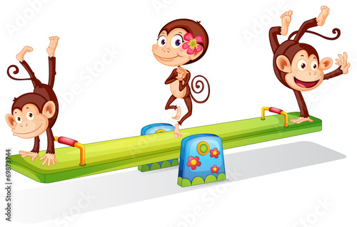 Three playful monkeys playing with the seesaw