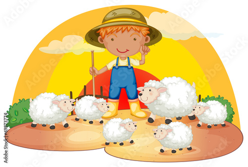 A young boy with his sheeps