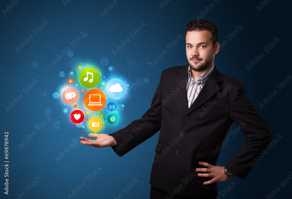 Multimedia icons in the hand of a businessman Multimedia icons in the hand of a businessman