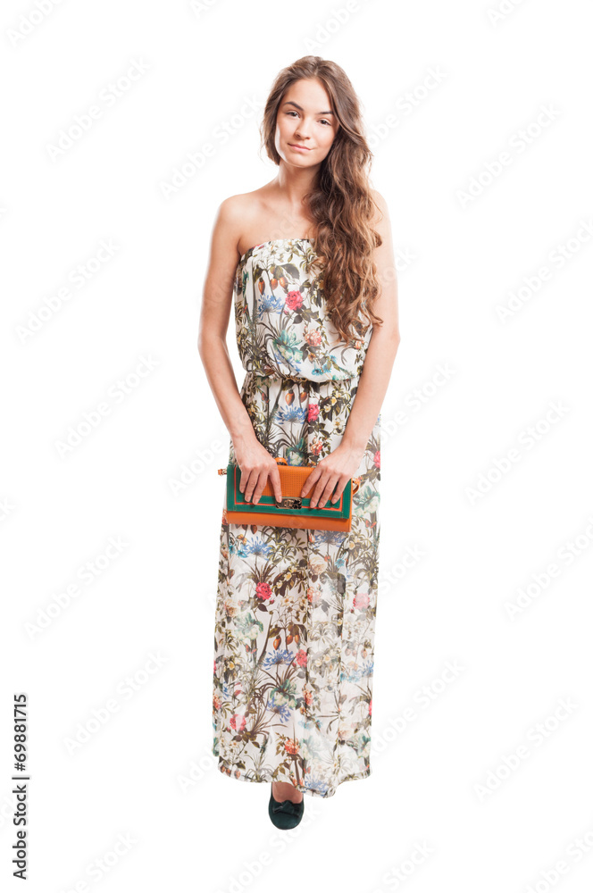 Long hair female model posing holding a purse. Long hair female model posing holding a purse.