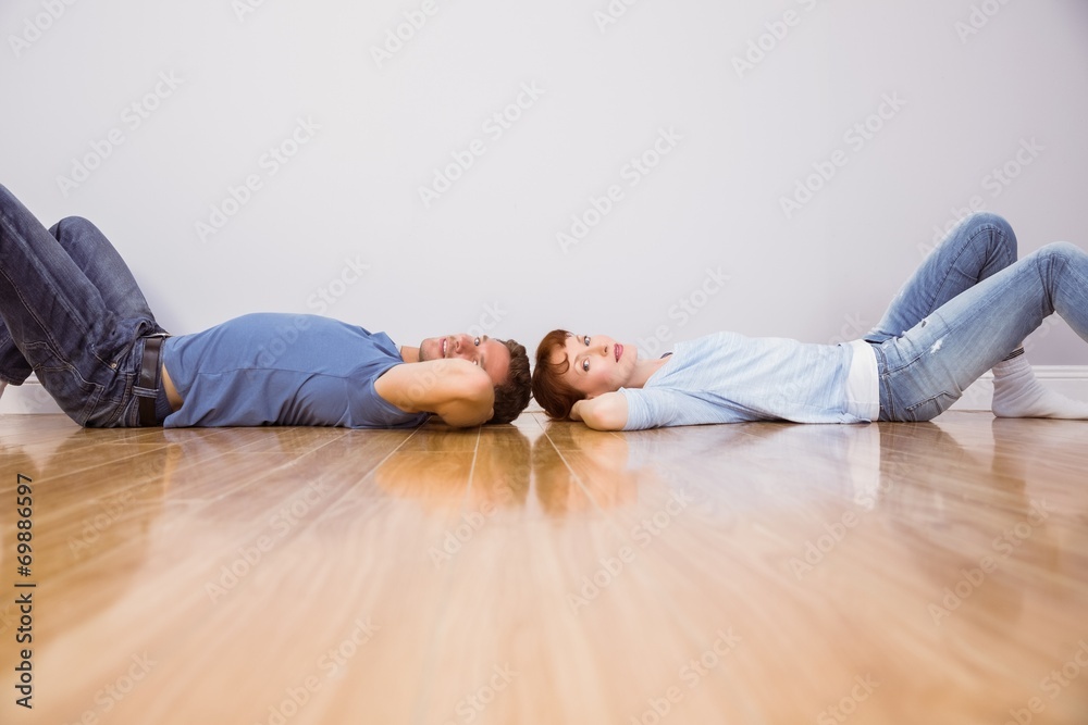 Couple lying on the floor