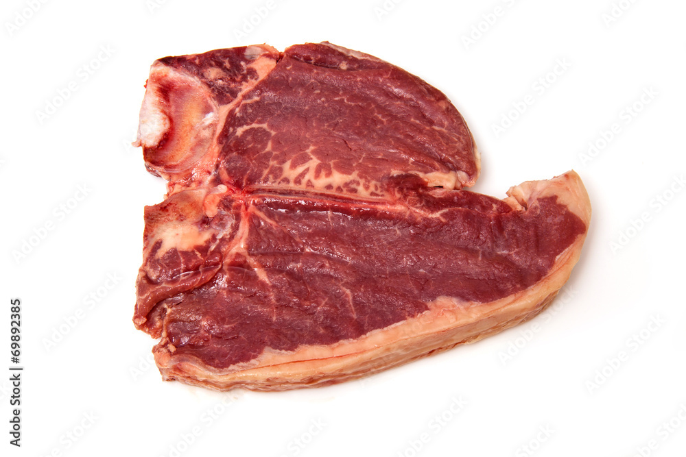T-bone steak isolated on a white studio background. T-bone steak isolated on a white studio background.