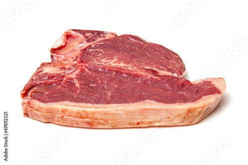 T-bone steak isolated on a white studio background.