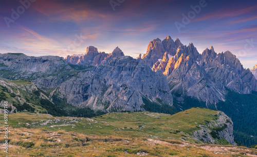 Colorful summer sunrise in Italy Alps, Tre Cime Di Lavaredo, Dol
