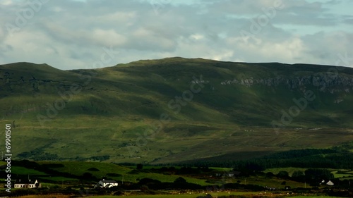 clouds shadows passing mountain