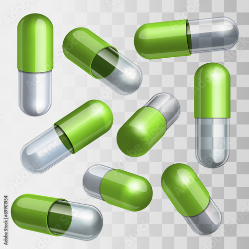 Set of green and transparent medical capsules in different