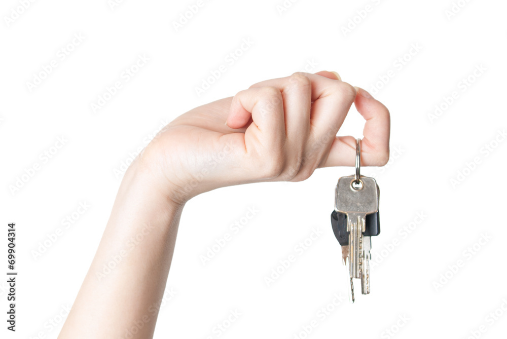 female hand holding a key isolated female hand holding a key isolated