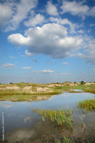 Marsh after sand excavation  landscape with beautiful sky