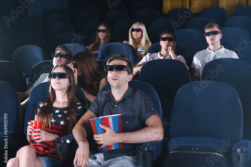 Young people watching movie...
