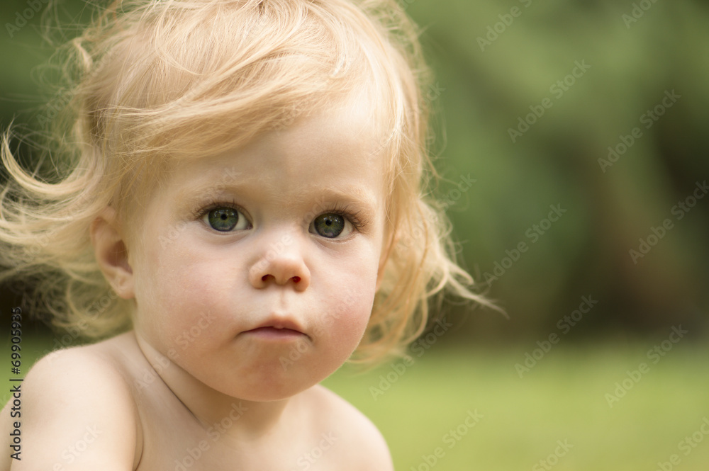 Outdoor portrait of the girl of 1 year old. Outdoor portrait of the girl of 1 year old.