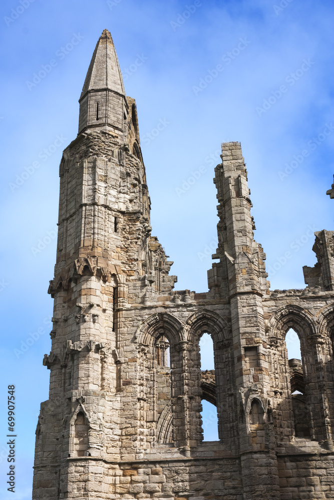 Whitby Abbey ruins against a blue sky