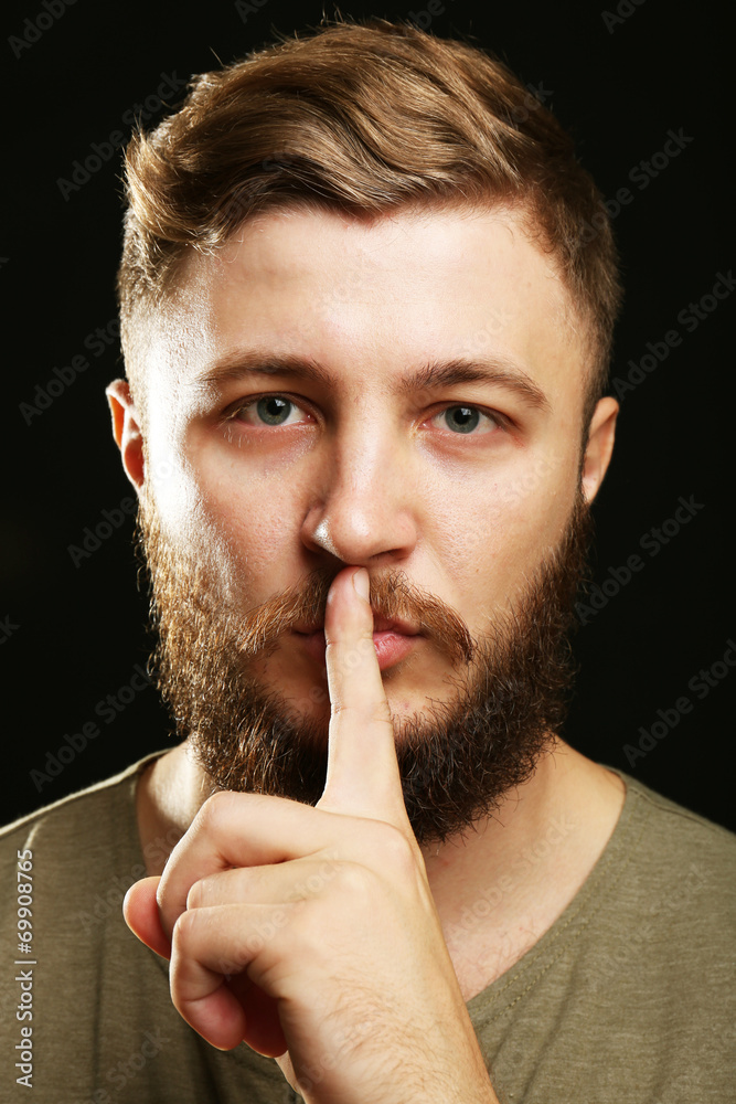 Portrait of handsome man with beard on black background Portrait of handsome man with beard on black background