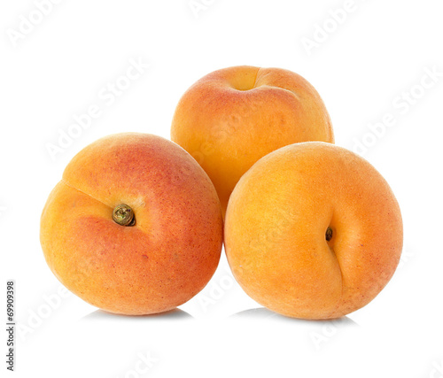 Ripe apricots fruit isolated on white background