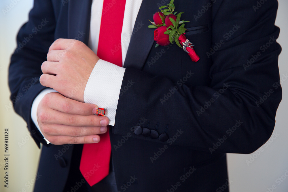 Hands of wedding groom getting ready in suit. Hands of wedding groom getting ready in suit.