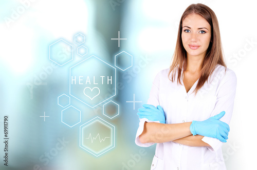 Young beautiful doctor in h...