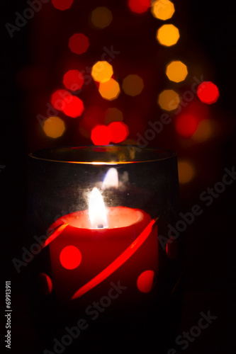 Bokeh beautiful light and fragrance candle in the darkness