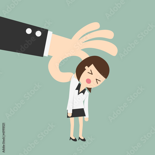 Big hand holding tiny business woman