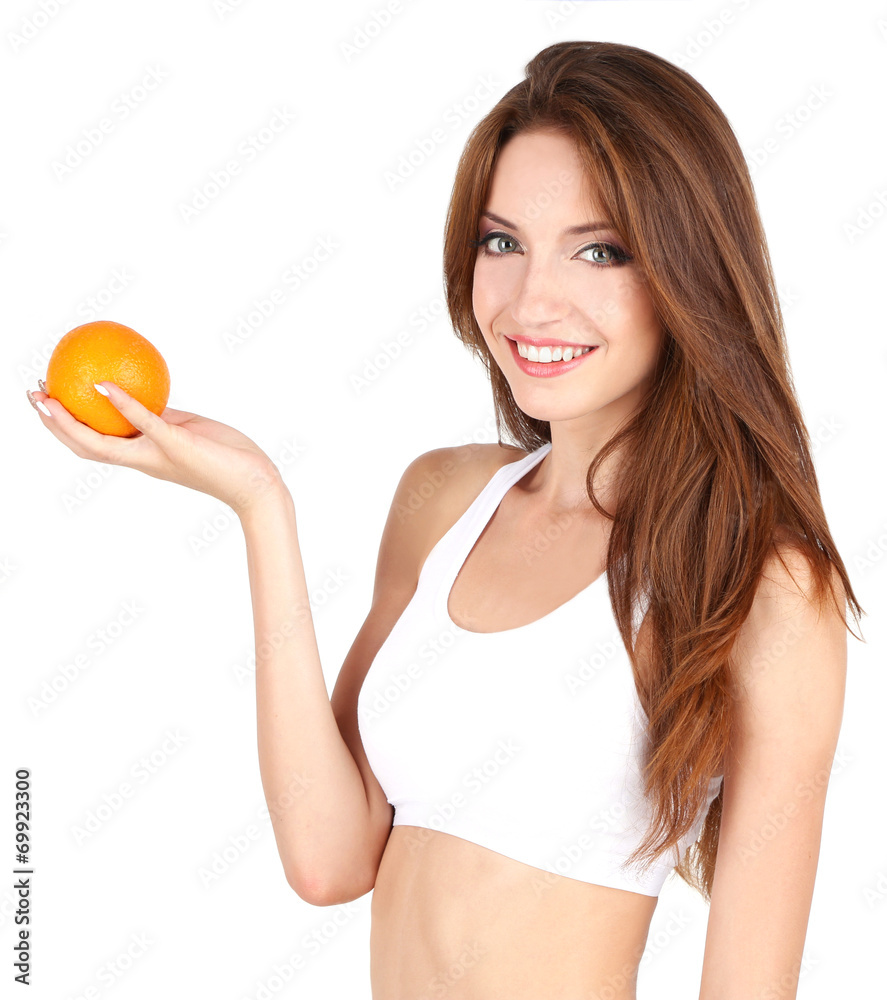 Young woman with orange isolated on white Young woman with orange isolated on white