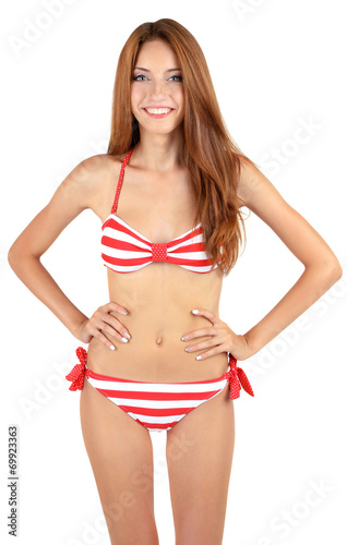 Beautiful young woman in swimsuit isolated on white