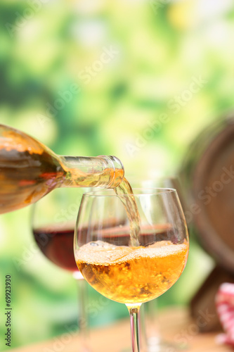 Wine pouring into wine glass, close-up
