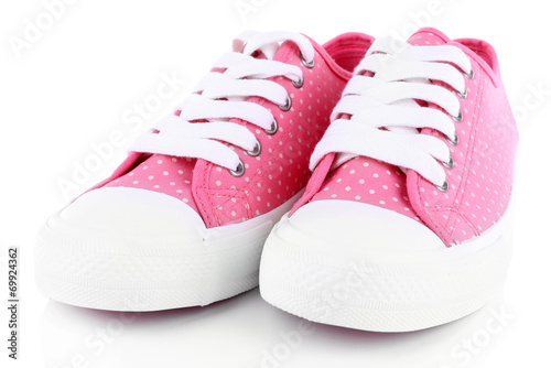 Pink trainers isolated on white