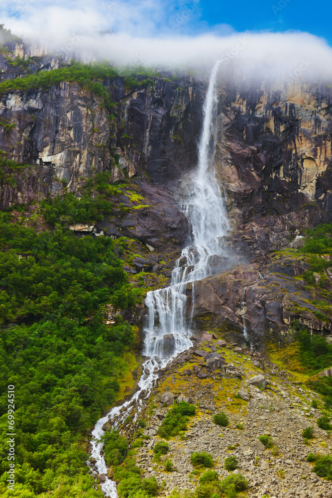 Waterfall near Briksdal glacier - Norway Waterfall near Briksdal glacier - Norway