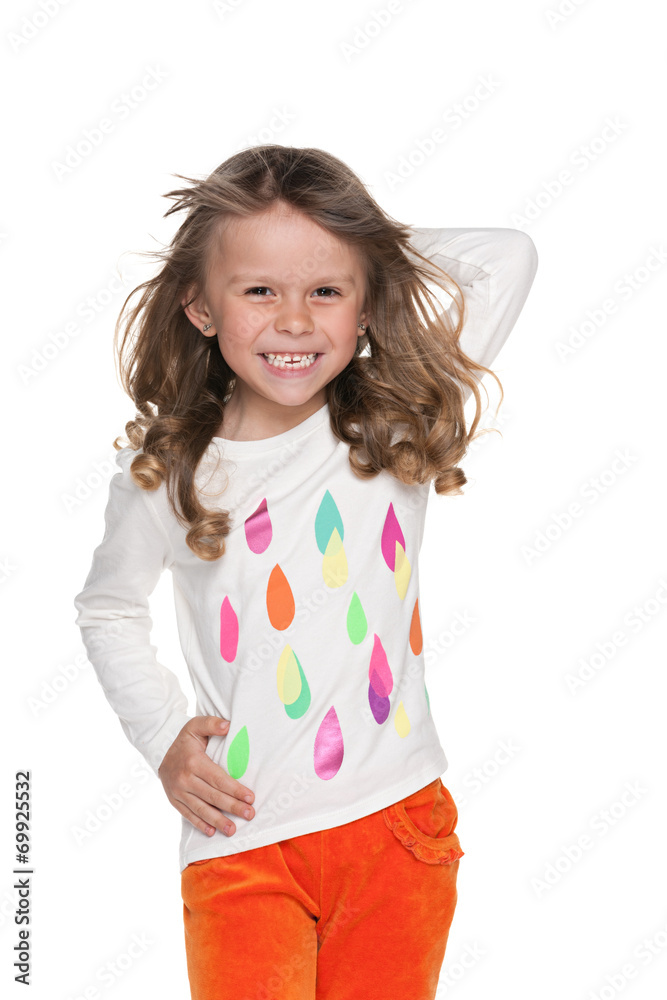 Walking fashion little girl against the white Walking fashion little girl against the white