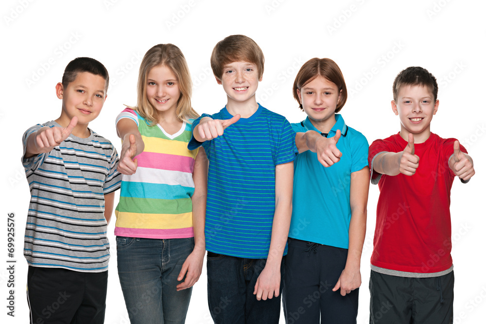 Five happy children hold his thumbs up