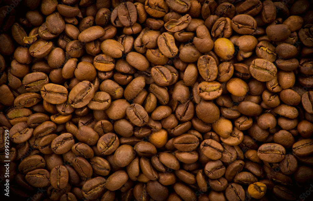 Naklejka premium Coffee beans background