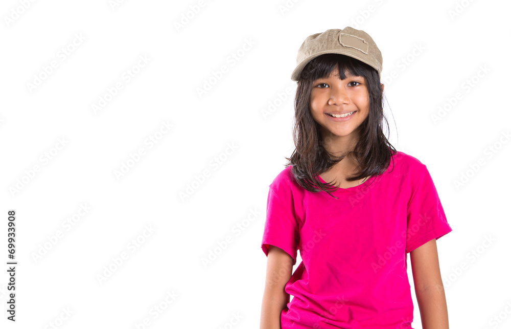 Young preteen Asian girl with a cap over white background Young preteen Asian girl with a cap over white background