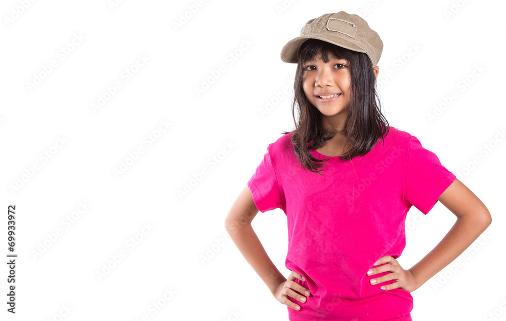 Young preteen Asian girl with a cap over white background Young preteen Asian girl with a cap over white background